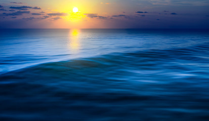 Fototapeta na wymiar Hope concept.Sea wave with sunrise