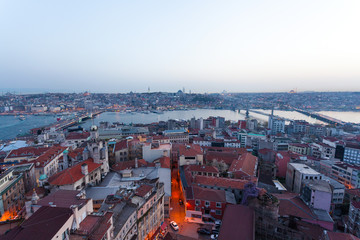 Obraz premium Panoramic views of the Bosphorus and the old part of Istanbul with lots of mosques at evening. Aerial view