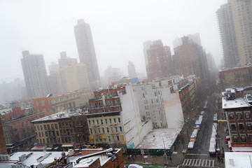 Fototapeta premium Snowy morning from a rooftop in NYC
