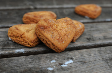 Homemade cookies with cinnamon  over wooden background
