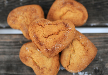 Homemade cookies with cinnamon  over wooden background
