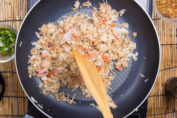 Chef  cooking rice in pan