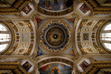 Fototapeta na wymiar The painting on the dome and walls of Saint Isaac's Cathedral in