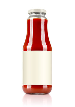 Red juice glass bottle with a blank label. Isolated on white background. File contains a path to isolation.