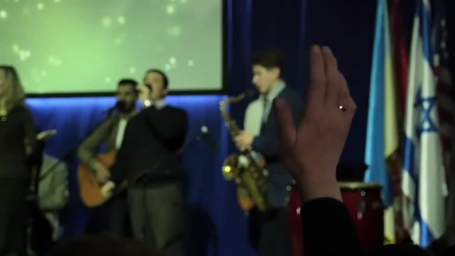 Worship, hand raised at church during serving God