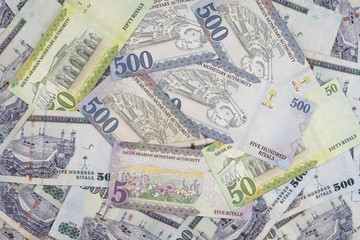 Fototapeta premium Scattered Saudi Riyal currency, New notes