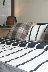 modern bedroom design with black and white blanket