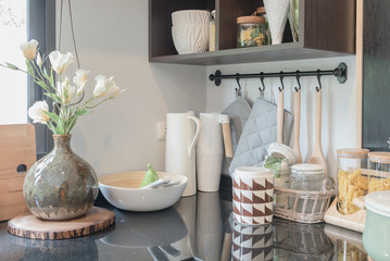 Naklejka na ściany i meble modern kitchen room with black granite on top of counter