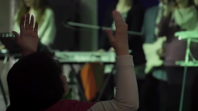 Worship, hand raised at church during serving God