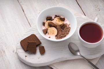 Healthy breakfast on the white wooden table top view