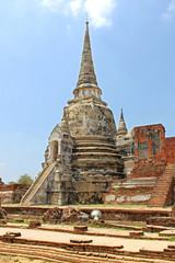 Fototapeta premium Buddhist temple ruins of Wat Mahathat in Ayutthaya, Thailand.