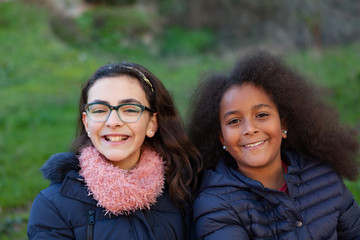 Two happy girls in the park