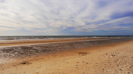 Fototapeta na wymiar Waves crashing on the sand on the beach Pacific ocean in Australia near Adelaide