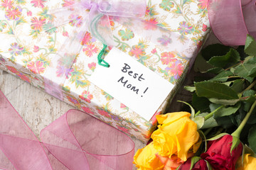 "Best Mom" Gift Tag on a Wrapped Mothers Day Present