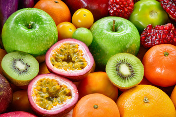Naklejka na ściany i meble Closeup group of ripe fruits juice arrangement