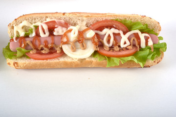 sandwich with sausage and vegetables isolated