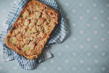 Home made artisan veggie pizza pie with onions peppers