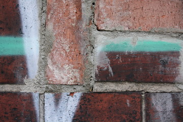 Brick wall with graffiti 4