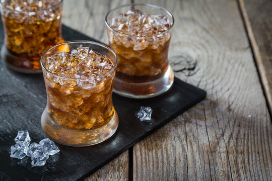 Rum And Cola Cocktail In Glasses