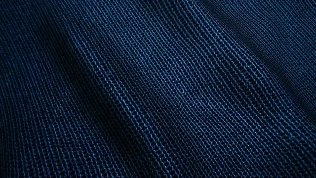 dark blue high quality jeans texture,moving waves.Seamless loop