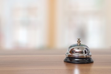 Support and service bell in hotel on blurred background.