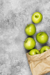 Ripe green apples on a light background. Top view, copy space. F