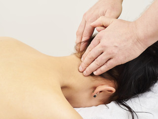 Professional masseur and a woman customer