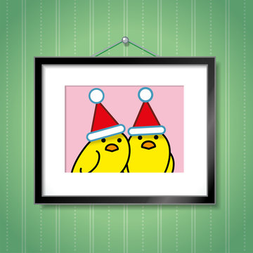 Couple of Yellow Chicks Wearing Santa Hats in Picture Frame