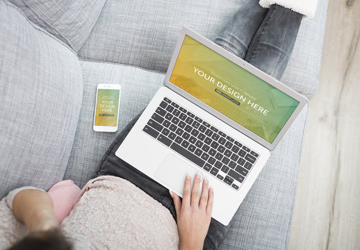 Top View of Laptop and Smartphone User on Couch Mockup 2