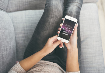 Top View Mockup of Smarphone User on Couch 3