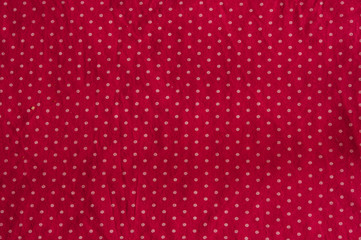 red background with polka dots