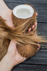 Holding coconut in hands