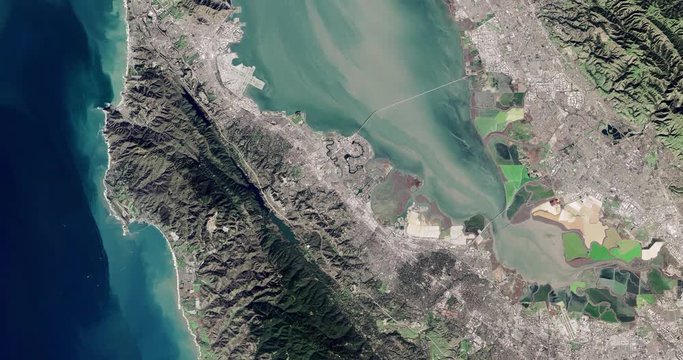 High-altitude overflight aerial of the south San Francisco Bay, California. Clip loops and is reversible. Elements of this image furnished by USGS/NASA Landsat