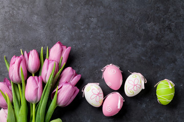 Pink tulip flowers and easter eggs
