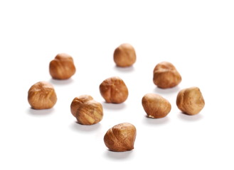 Whole hazelnuts isolated on white background
