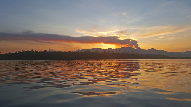 Active Galelo volcano on sunset