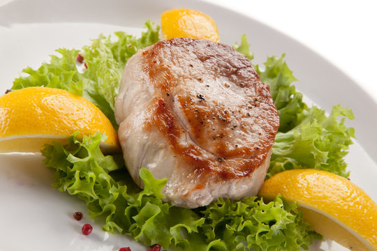 Fish dish - fried tuna steak and vegetables 