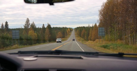 Fototapeta na wymiar View from a car on finnish nature
