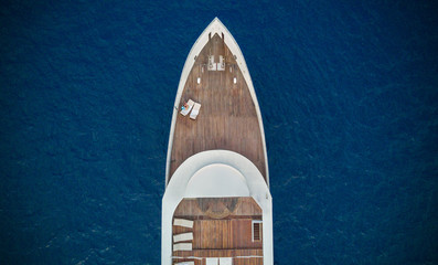Aerial view of big yacht in sea - obrazy, fototapety, plakaty
