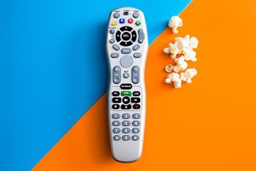  Tv cable remote and popcorn. Watching tv. Life style, entertainment, young people. fashion, design and interior concept