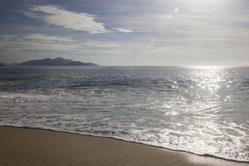 Beautiful sunset on the beach of Caraguatatuba, north coast of t