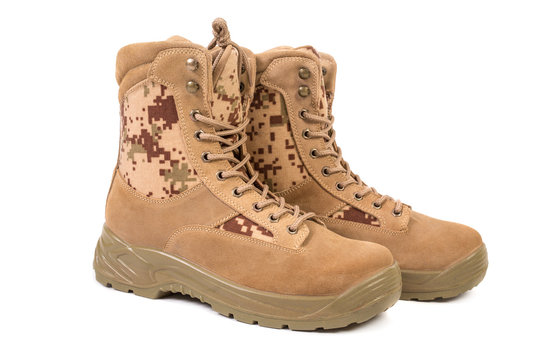 Desert brown canvas combat boots, isolated