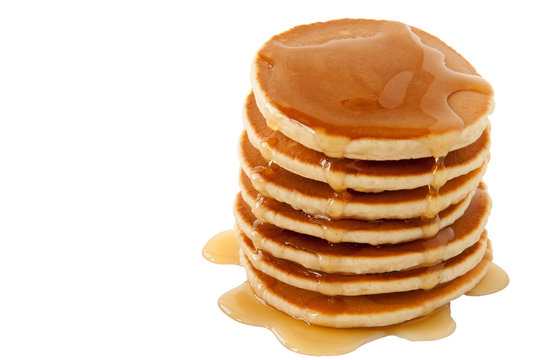 Pancakes with maple syrup isolated on a white background. Breakfast, snacks. Pancakes Day.