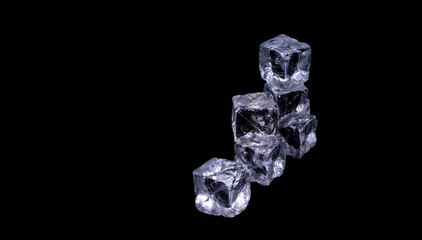 ice cubes on a black background. ice cubes stacked pyramid