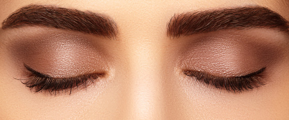 Perfect shape of eyebrows and extremly long eyelashes. Macro shot of fashion eyes visage. Before and after - obrazy, fototapety, plakaty