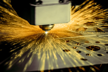 CNC Laser cutting of metal, modern industrial technology. .