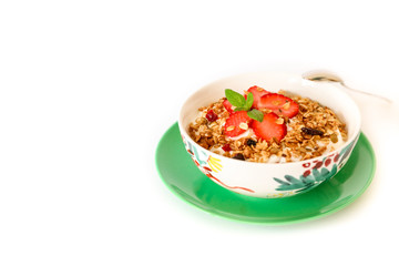 Healthy breakfast granola, strawberry and yogurt isolated on white background.