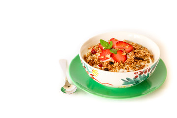 Healthy breakfast granola, strawberry and yogurt isolated on white background.