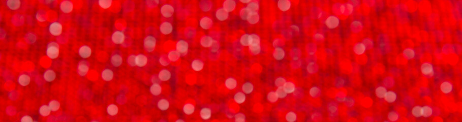 Canvas of red rhinestones. Bokeh Background.