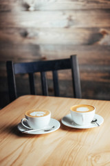 Two cups of gourmet coffee house cappuccino 